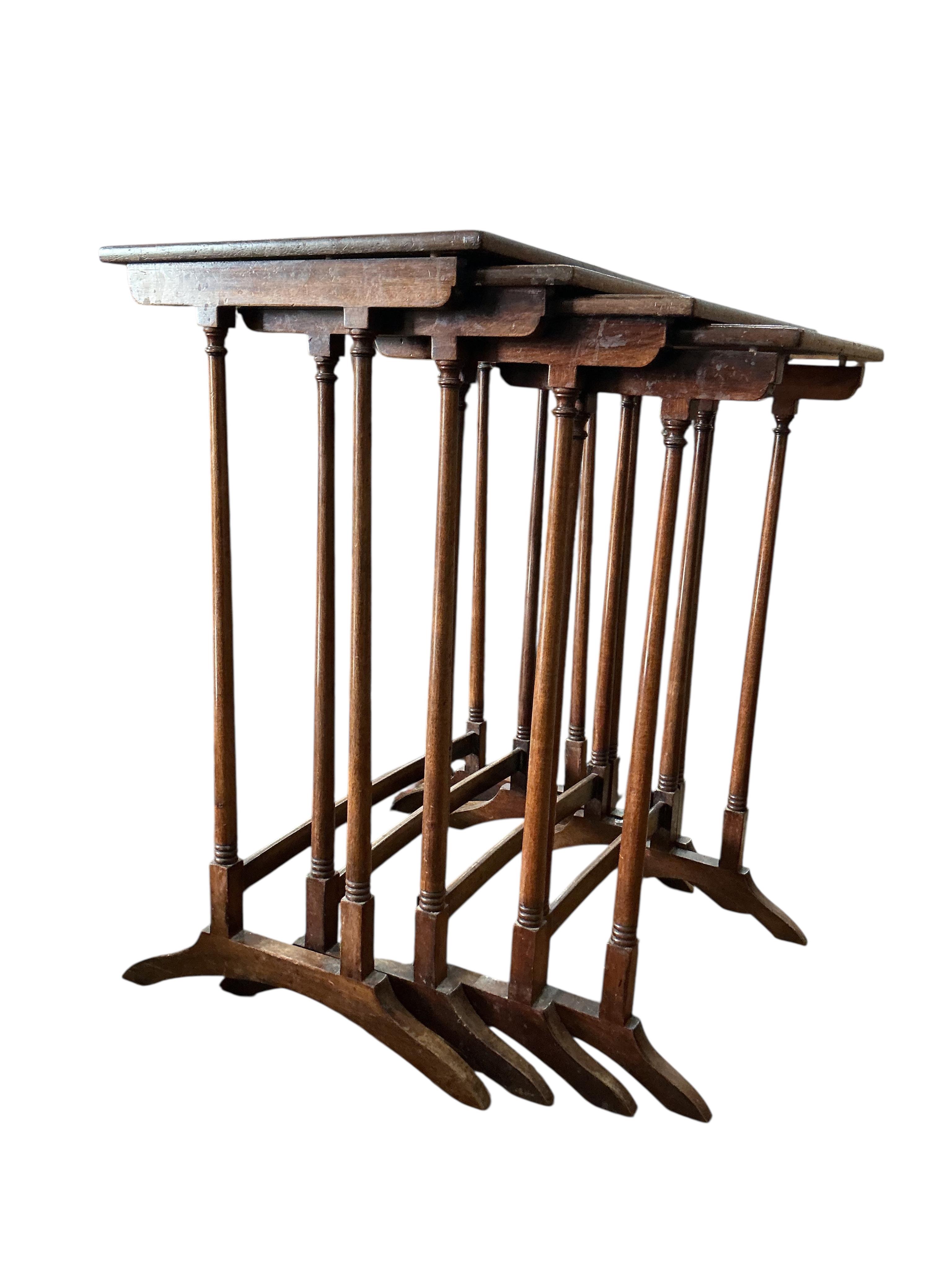A quartetto of Edwardian rectangular mahogany tables, width 53cm, depth 36cm, height 70cm together with a George III style mahogany toilet mirror